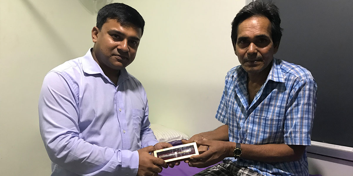 Receiving token of appreciation from happy patient